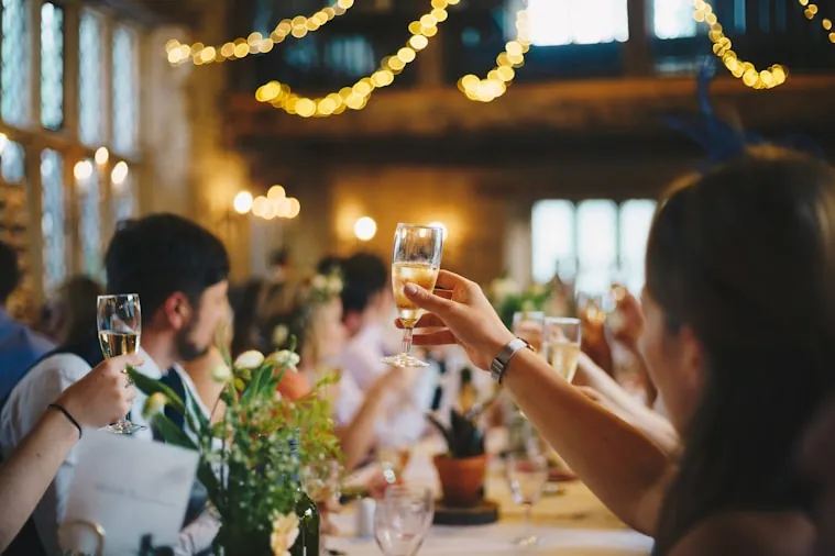 Guests raising glasses at an industry event